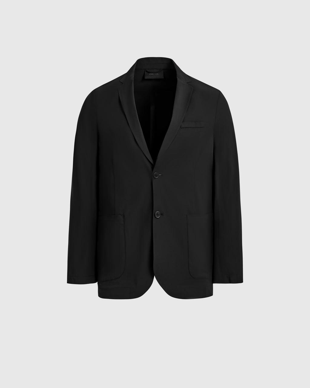 The SPENCER - 6525024 Black blazer by Rudsak features a classic single-breasted design with two buttons, notched lapels, chest pocket, and two front patch pockets. Shown on a plain light gray background, it elevates any modern wardrobe.