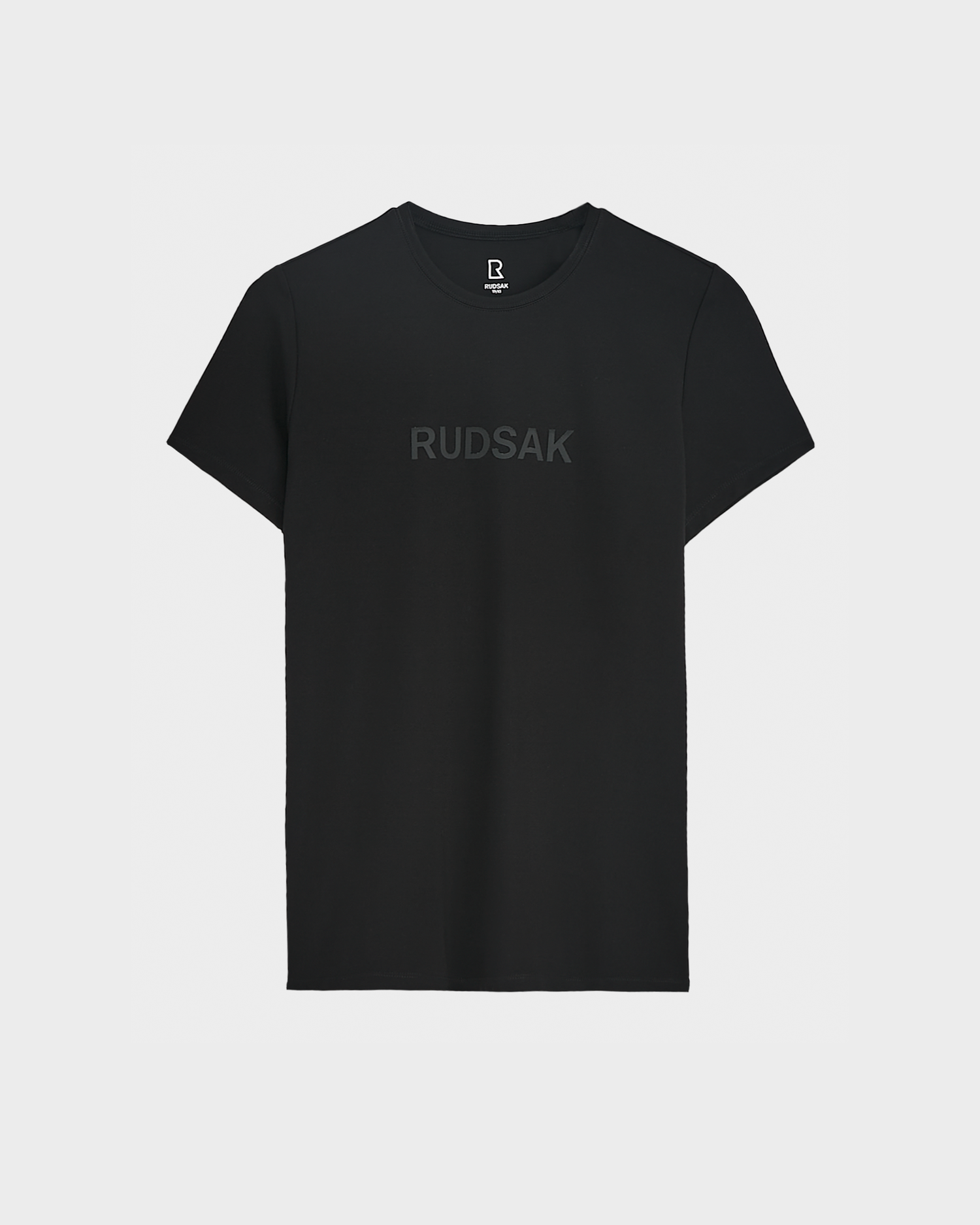 The TIFFANY - 8523048 BLACK by RUDSAK is a plain black women's T-shirt featuring subtle black "RUDSAK" lettering across the chest, shown against a white background.