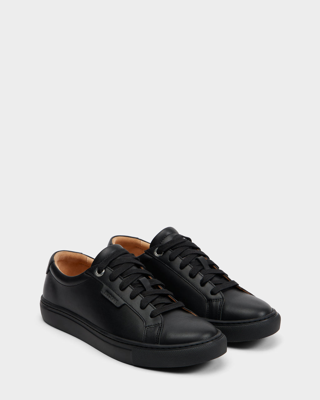 A pair of Rudsak LARIS - 6225000 Black men’s leather sneakers with black laces and soles, positioned side by side on a plain light gray background.