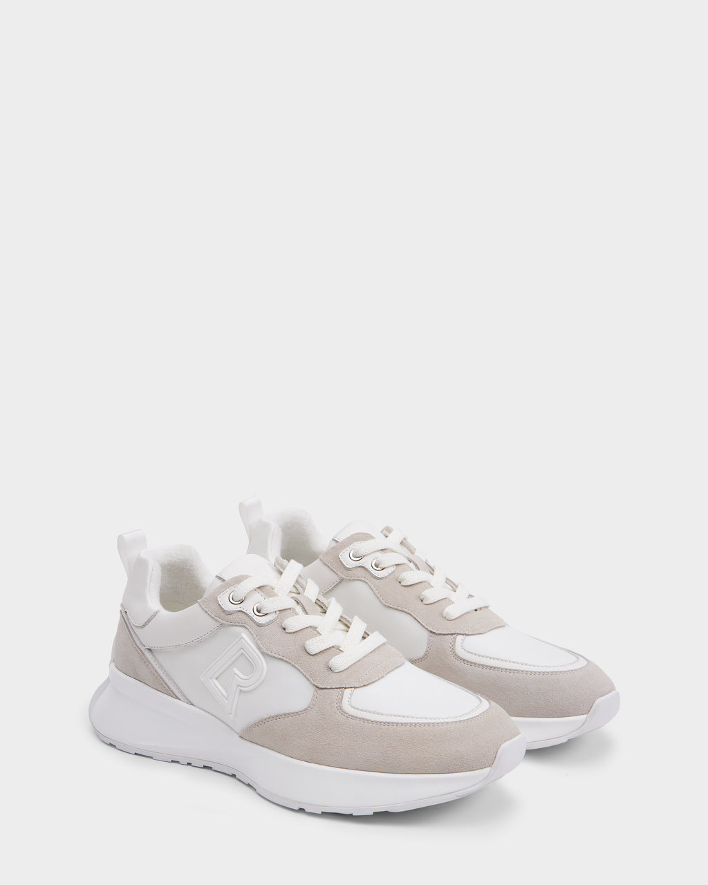 The Rudsak LIONEL - 6225001 Iceland mens lace-up sneakers feature beige suede accents, a modern design, thick white soles, and a raised “R” logo on the side, shown against a white background.