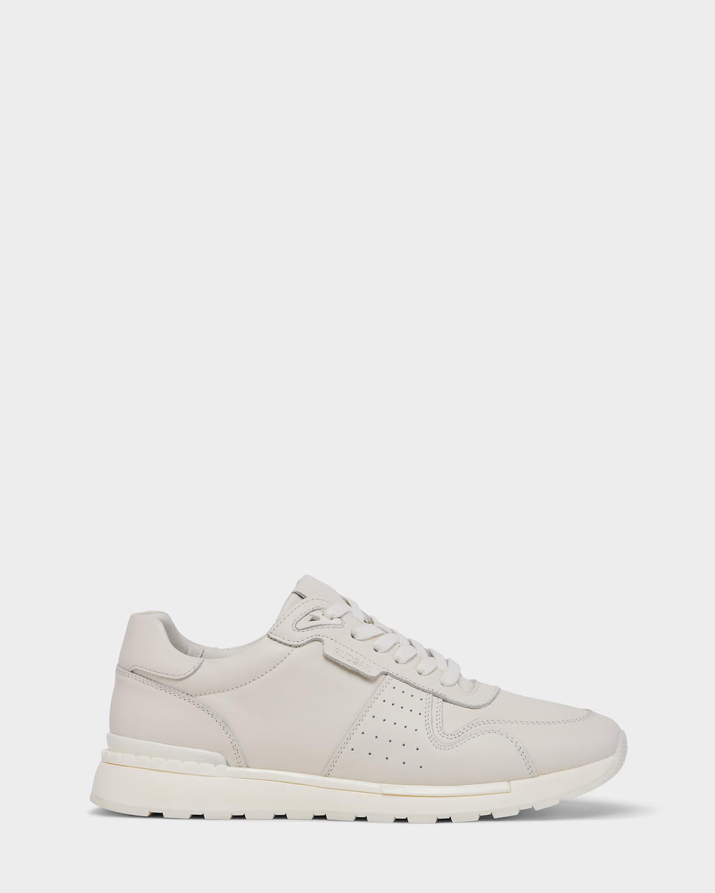 The MALONE - 6225010 Iceland by Rudsak is a men’s beige leather sneaker with white laces, perforated sides, and a white rubber sole—crafted from premium materials and ideal for everyday wear, shown on a plain white background.