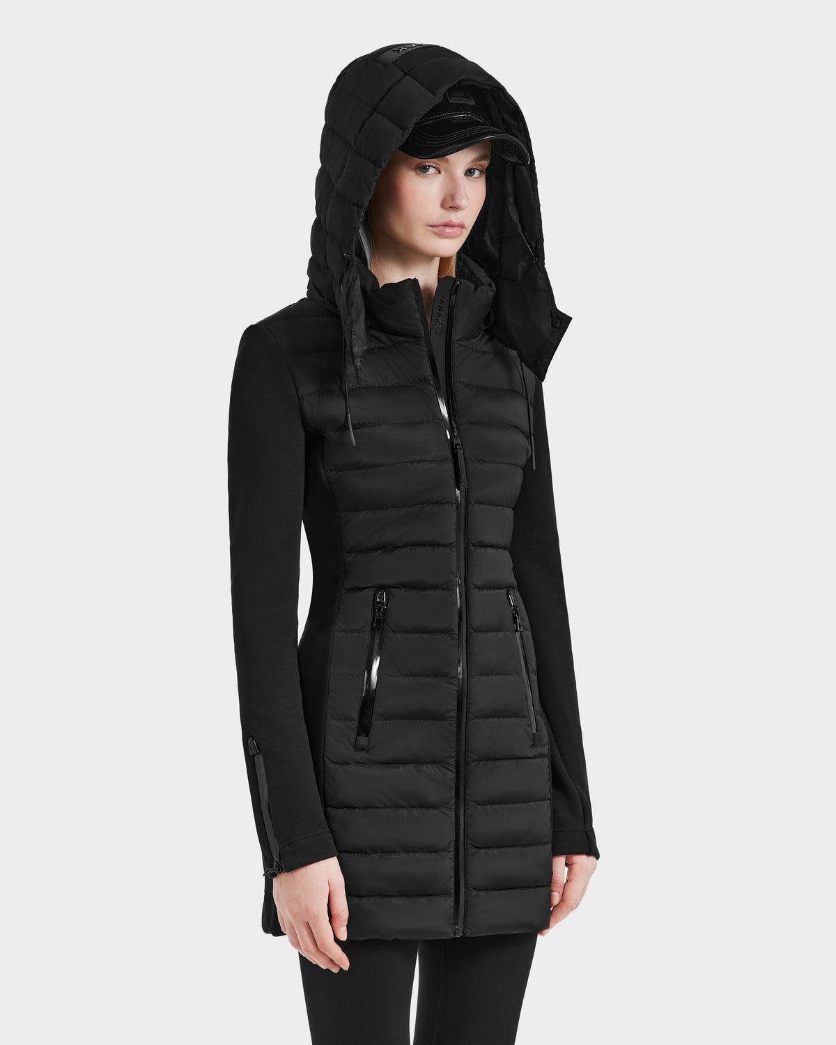 A woman wearing the Rudsak MERINA - 8124826 lightweight black jacket.