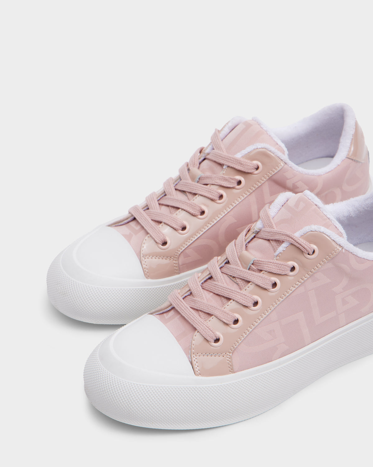 The Rudsak RIMA - 8225001 Blush Pattern womens platform sneakers feature light pink uppers with a subtle geometric side design, white rubber toe caps and soles, all set against a plain white background.
