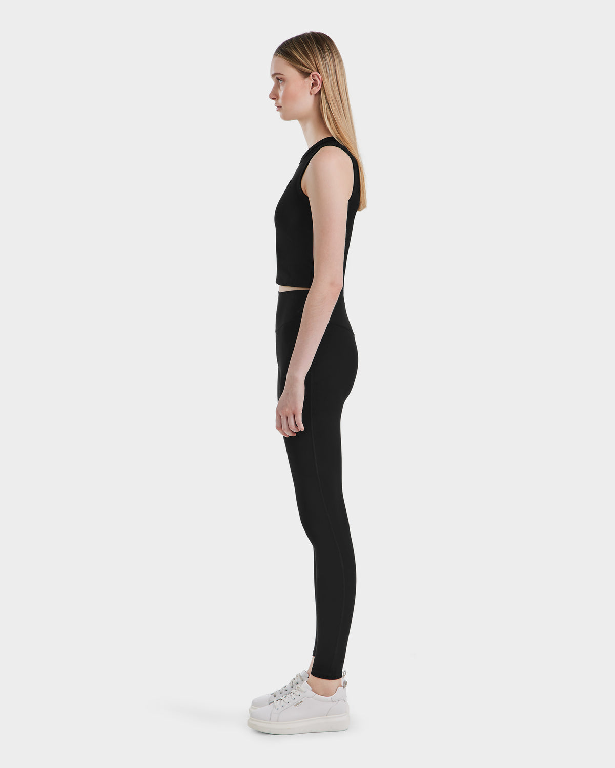 A woman in a black outfit featuring Rudsak SONOMA - 8525071 leggings.