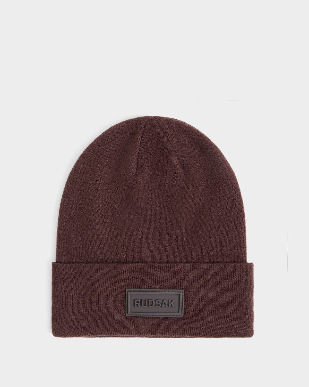 Dark brown DILLION - U423501 Espresso cuffed beanie with a rectangular patch featuring the Rudsak brand name on the front.