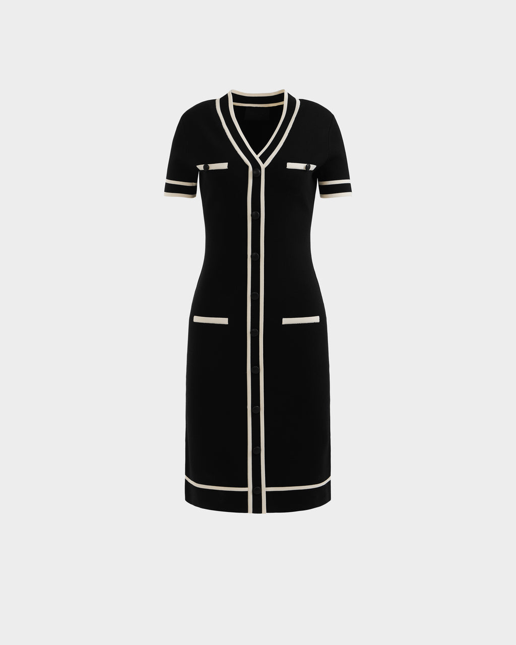 The VINNIE - 8526038 Black by Rudsak is a knee-length knit midi dress with a tailored V-neck, white trim, button-down front, short sleeves, and four pockets for both style and functionality.