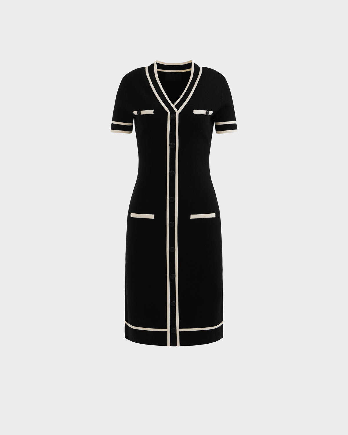 The VINNIE - 8526038 Black by Rudsak is a knee-length knit midi dress with a tailored V-neck, white trim, button-down front, short sleeves, and four pockets for both style and functionality.