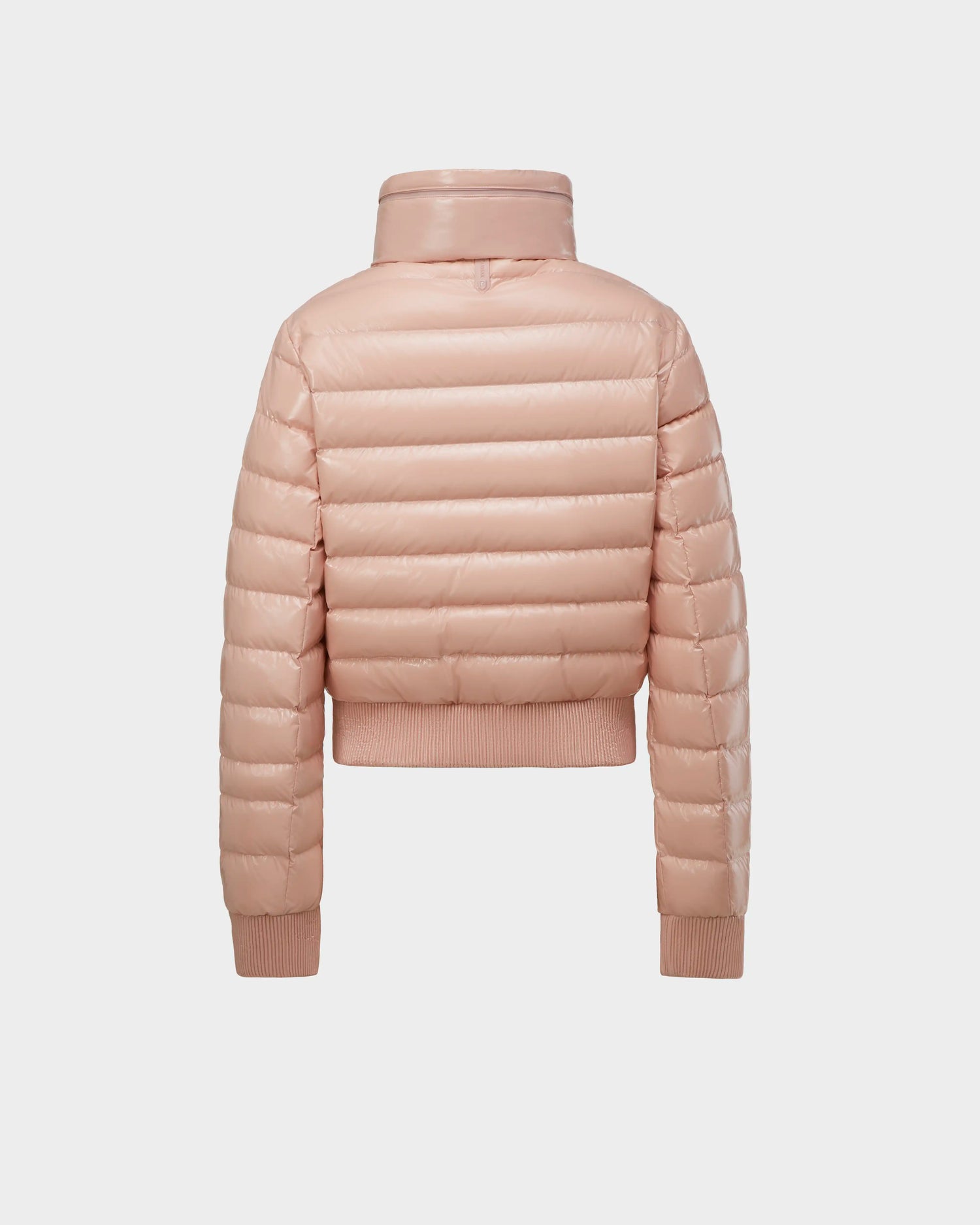 The Rudsak SOLENE - L124002 Soft Pink women’s fitted down puffer jacket features horizontal quilting, ribbed cuffs, and a high collar, shown from the back on a white background—perfect lightweight warmth for spring.