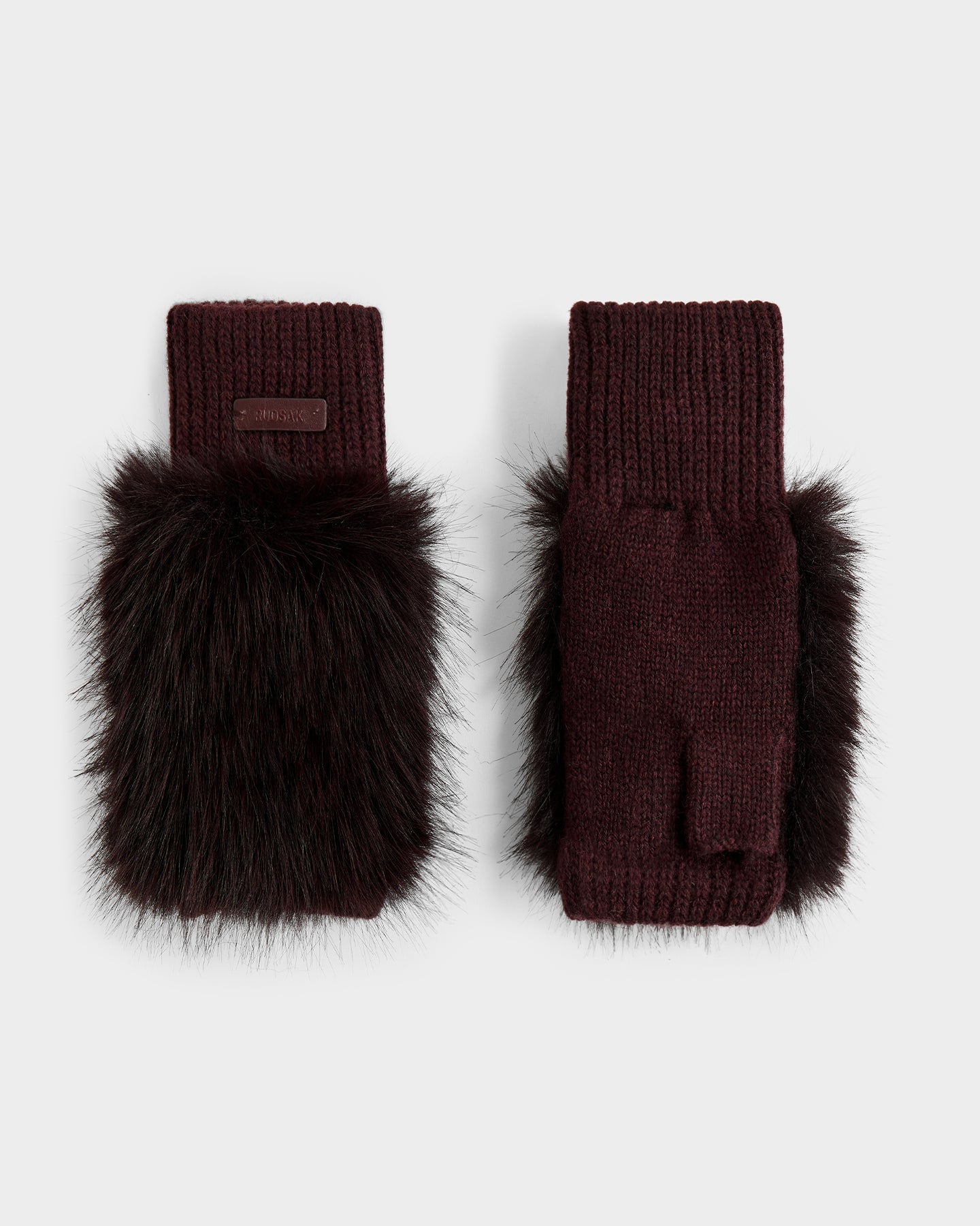 A pair of Rudsak LIA - 8425007 Bordeaux women’s burgundy wool-blend fingerless mittens with thick dark brown faux fur trim on the back, displayed on a plain light gray background.