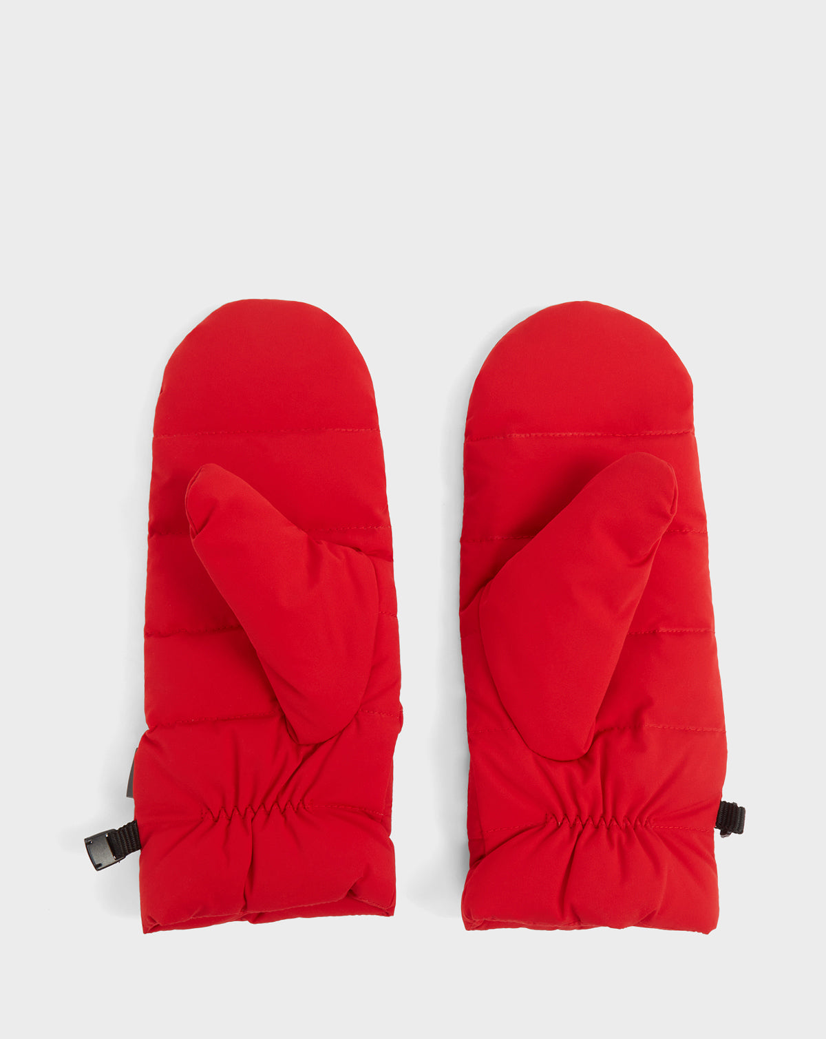A pair of ELIA - CA EN 8421505 POPPY RED womens mittens by Rudsak, quilted in bright red with elastic cuffs and a black strap on the left, made with RDS-certified down—ideal for winter activities. Displayed on a white background.