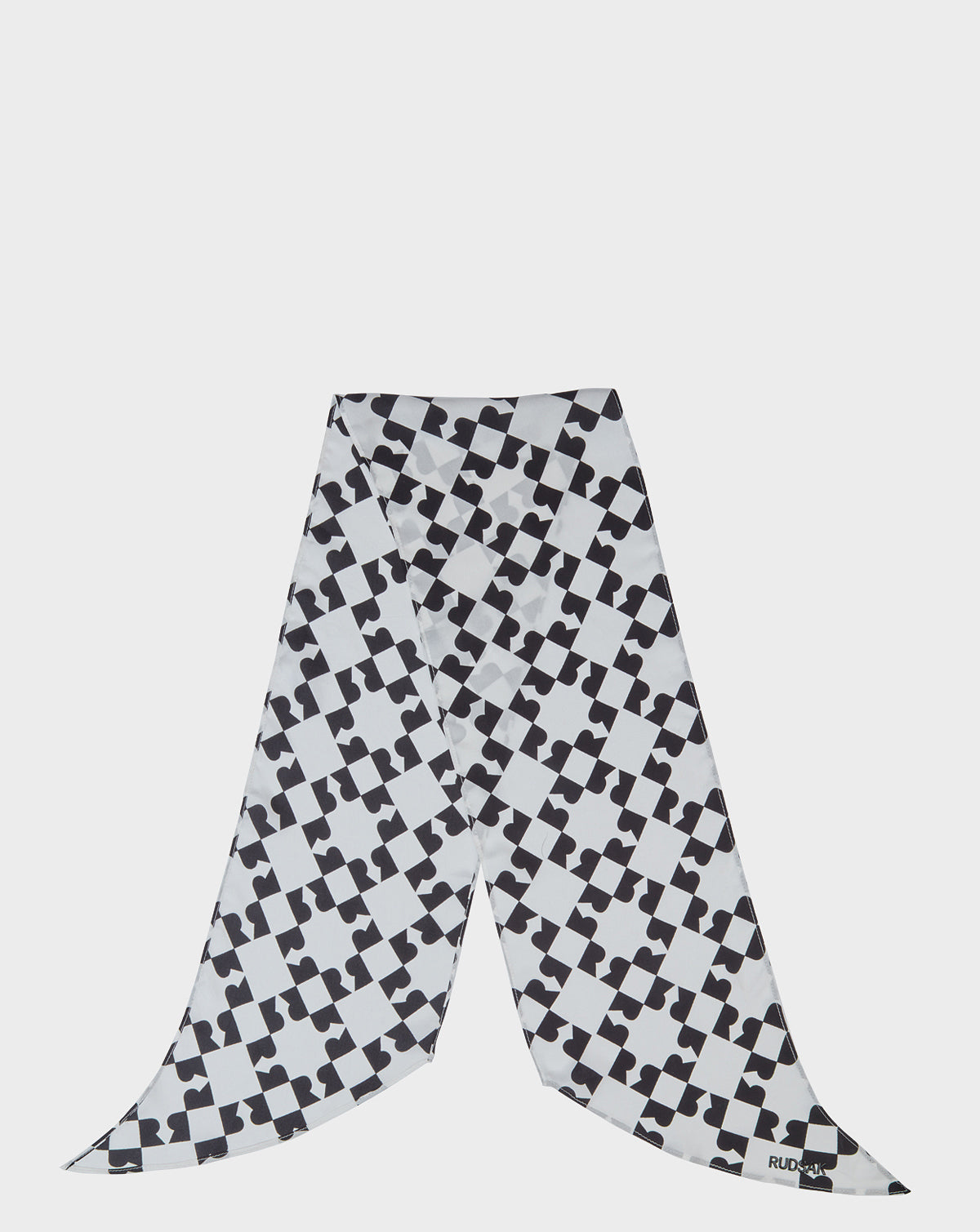 The Rudsak ODELYA FINAL SALE - 8422001 WHITE is a lightweight, long rectangular women's silk scarf in a black and white checkered pattern with interlocking heart shapes, shown on a plain white background for a unique print look.